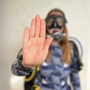 stop scuba hand signals